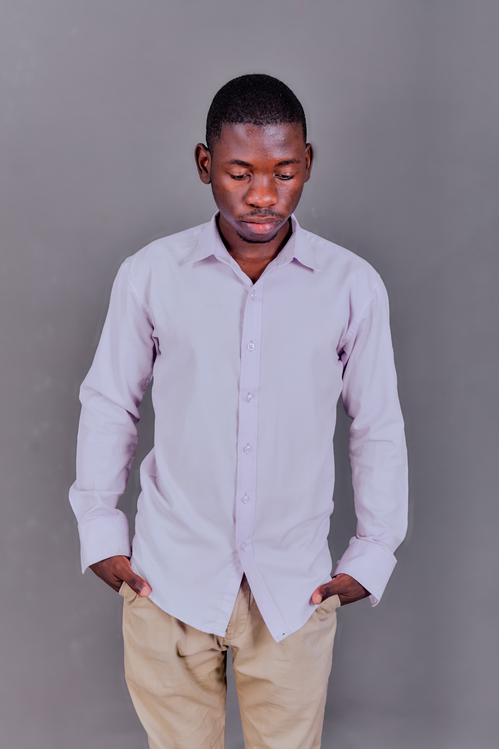 Kudumo Kupembona Andreas standing in a studio portrait